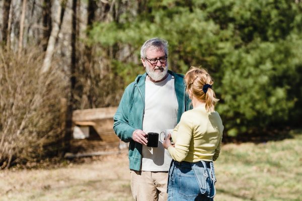 SECURE Act 2.0, image of man and woman talking outdoors