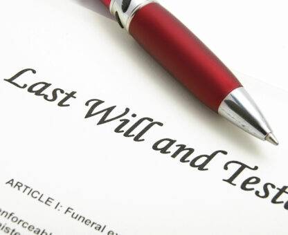 last will and testament document with a pen, representing estate planning and probate preparation