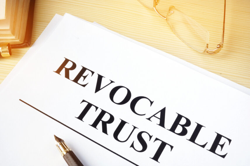 copy of a revocable trust on a desk